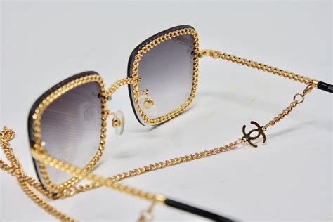 designer sunglasses with chain attached.